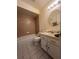 Clean bathroom with a tub, toilet, and vanity at 5022 Log Wagon Rd, Ocoee, FL 34761