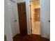 Hallway with doors to bedrooms and a bathroom at 5022 Log Wagon Rd, Ocoee, FL 34761