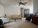 Spacious living room featuring comfortable seating and a cabinet at 5022 Log Wagon Rd, Ocoee, FL 34761