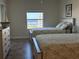 Guest bedroom with two twin beds and ocean view at 5300 S Atlantic Ave # 604, New Smyrna Beach, FL 32169