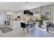 Modern white kitchen with stainless steel appliances and island at 543 Sunbranch Ln, Casselberry, FL 32707