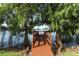 Wooden walkway providing tranquil lake access at 596 Orange Dr # 151, Altamonte Springs, FL 32701