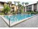 Relaxing community pool with ample deck space at 596 Orange Dr # 151, Altamonte Springs, FL 32701