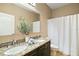 Shared bathroom with double sinks and granite countertop at 745 Andrew St, Eustis, FL 32726