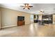 Bright living room with hardwood floors, kitchen, and dining area views at 745 Andrew St, Eustis, FL 32726