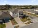 Two-story house with gray roof, attached garage, and small front yard at 9118 Waverly Walk Dr, Orlando, FL 32817