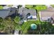 Aerial view of house, yard, pool, and shed at 10140 Bridlewood Ave, Orlando, FL 32825