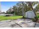 Backyard with storage shed and large pool at 10140 Bridlewood Ave, Orlando, FL 32825