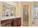 Bathroom with vanity, large mirror, and shower at 107 Alexandra Woods Dr, Debary, FL 32713