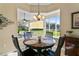 Bright breakfast nook with view of backyard and golf course at 107 Alexandra Woods Dr, Debary, FL 32713