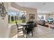 Breakfast nook with a view of the backyard from a bay window at 107 Alexandra Woods Dr, Debary, FL 32713