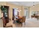 Spacious dining area with hardwood floors and large windows at 107 Alexandra Woods Dr, Debary, FL 32713