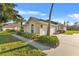 House exterior with garage and nicely landscaped yard at 107 Alexandra Woods Dr, Debary, FL 32713