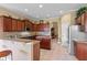 Spacious kitchen with granite countertops and stainless steel appliances at 107 Alexandra Woods Dr, Debary, FL 32713