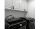 Laundry room with Samsung washer and dryer at 11833 Founders St, Orlando, FL 32832