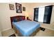 Cozy bedroom with full-size bed and Spiderman theme at 142 Sandy Point Way, Clermont, FL 34714