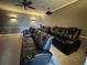 Home theater featuring comfortable seating and dimmable lighting at 15041 Gaulberry Run, Winter Garden, FL 34787