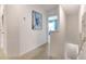 Upstairs hallway with carpeted floors and artwork at 1521 Isleta Loop, Kissimmee, FL 34741