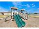 Playset with two slides and climbing features at 1521 Isleta Loop, Kissimmee, FL 34741