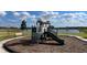 Playset near a lake, with slide and climbing area at 1521 Isleta Loop, Kissimmee, FL 34741