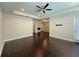 Large main bedroom with hardwood floors and access to the back patio at 15306 Southern Martin St, Winter Garden, FL 34787