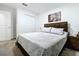 Well-lit bedroom featuring a double door closet at 1534 Marksman Rd, Eagle Lake, FL 33839