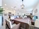 Bright dining room with table and wicker chairs at 1534 Marksman Rd, Eagle Lake, FL 33839