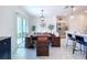 Dining area with table and chairs near sliding doors at 1534 Marksman Rd, Eagle Lake, FL 33839