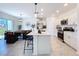 Modern kitchen with stainless steel appliances and white cabinets at 1534 Marksman Rd, Eagle Lake, FL 33839