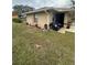 Side view of house with patio furniture at 160 Clay Cut Cir, Haines City, FL 33844