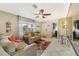 Cozy living room with neutral tones, tile floors, and lots of natural light at 160 Clay Cut Cir, Haines City, FL 33844