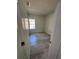 Cozy bedroom with wood-look floors and a bright window at 1617 Cumin Dr, Kissimmee, FL 34759