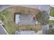 Property's aerial view highlighting its backyard pool and landscaping at 1685 Waterview Loop, Haines City, FL 33844