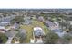 Aerial view showing neighborhood homes and pool at 1685 Waterview Loop, Haines City, FL 33844