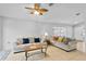 Living room with two sofas, a coffee table and neutral colored walls at 1685 Waterview Loop, Haines City, FL 33844