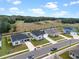 Aerial view of a row of houses in a new residential community at 1933 Burgundy Dr, Minneola, FL 34715