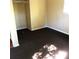 Small bedroom with dark carpet and closet at 2204 Suanee Ave, Eustis, FL 32726