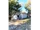 Side view of the house and a small shed at 2204 Suanee Ave, Eustis, FL 32726