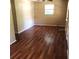 Living room with wood-look flooring at 2204 Suanee Ave, Eustis, FL 32726