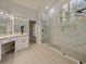 Bathroom with corner vanity and large walk-in shower at 240 Shady Oaks Cir, Lake Mary, FL 32746