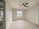 Simple bedroom with a window and ceiling fan at 240 Shady Oaks Cir, Lake Mary, FL 32746