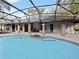 Sparkling screened pool and spacious patio area at 240 Shady Oaks Cir, Lake Mary, FL 32746