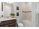 Clean bathroom with bathtub, shower, and modern vanity at 2436 Belle Haven Way, Davenport, FL 33896