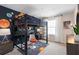 bedroom with a built-in loft bed and space-themed decor at 2436 Belle Haven Way, Davenport, FL 33896