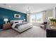 Large main bedroom with sitting area and stylish decor at 2436 Belle Haven Way, Davenport, FL 33896