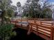 Reed Canal Park entrance with a wooden bridge at 2845 Oak Lea Dr, South Daytona, FL 32119