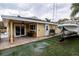 Outdoor patio area with seating and a view of the water at 2845 Oak Lea Dr, South Daytona, FL 32119