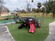 playground with slides, climbing structures, and swings at 2845 Oak Lea Dr, South Daytona, FL 32119