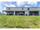 Townhouse rear view, showing patio access at 3344 Private Oak Dr, Apopka, FL 32703