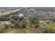 Aerial view of property showing home, pool, and surrounding area at 3662 Mohawk Dr, Mount Dora, FL 32757